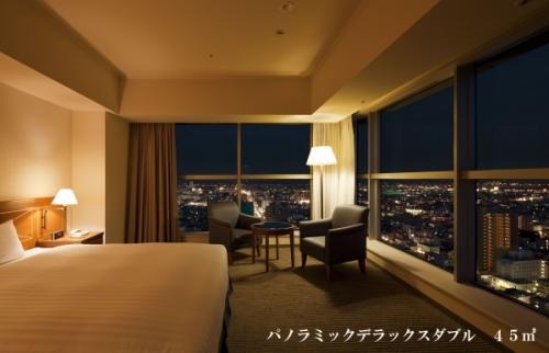 輝く夜の夜景を高層階のお部屋から一望できます。